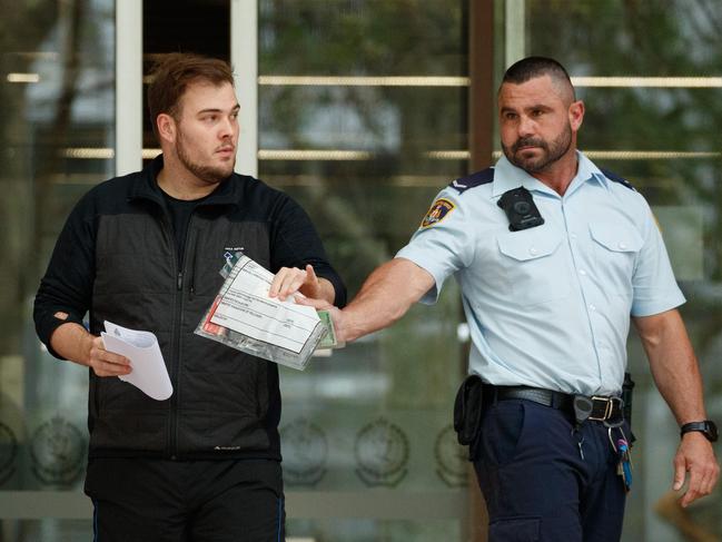 William Gulson walks out of Surry Hills Police Station after being released on bail on Saturday. Picture: NewsWire