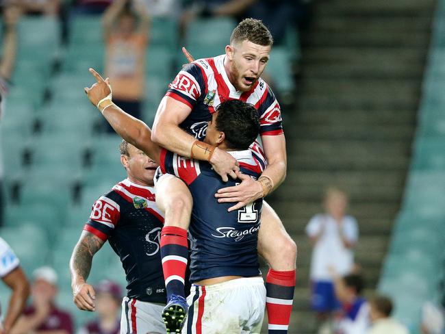 Latrell Mitchell and Jackson Hastings celebrate a try. Moore Park. Picture Gregg Porteous