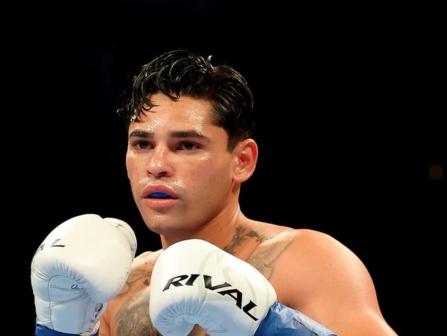 NEW YORK, NEW YORK - APRIL 20: Ryan Garcia (white trunks) prepares to fight Devin Haney during their WBC Super Lightweight title bout at Barclays Center on April 20, 2024 in New York City.   Al Bello/Getty Images/AFP (Photo by AL BELLO / GETTY IMAGES NORTH AMERICA / Getty Images via AFP)