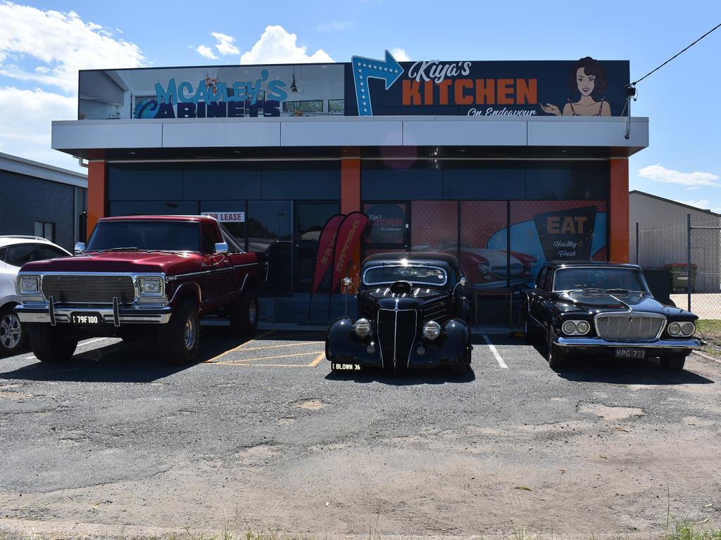 Hot rods parked outside Kiya's Kitchen on Endeavour Street in Mackay on Friday February 25, 2022. Picture: Madeleine Graham