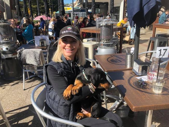 Ms Howard with her beloved pup Harvey at Terrigal.