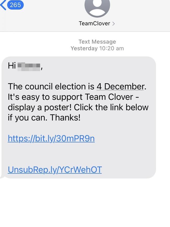 Just a few weeks after the letter was sent, Ms Moore sent a text to residents urging them to display posters. Photo: Supplied