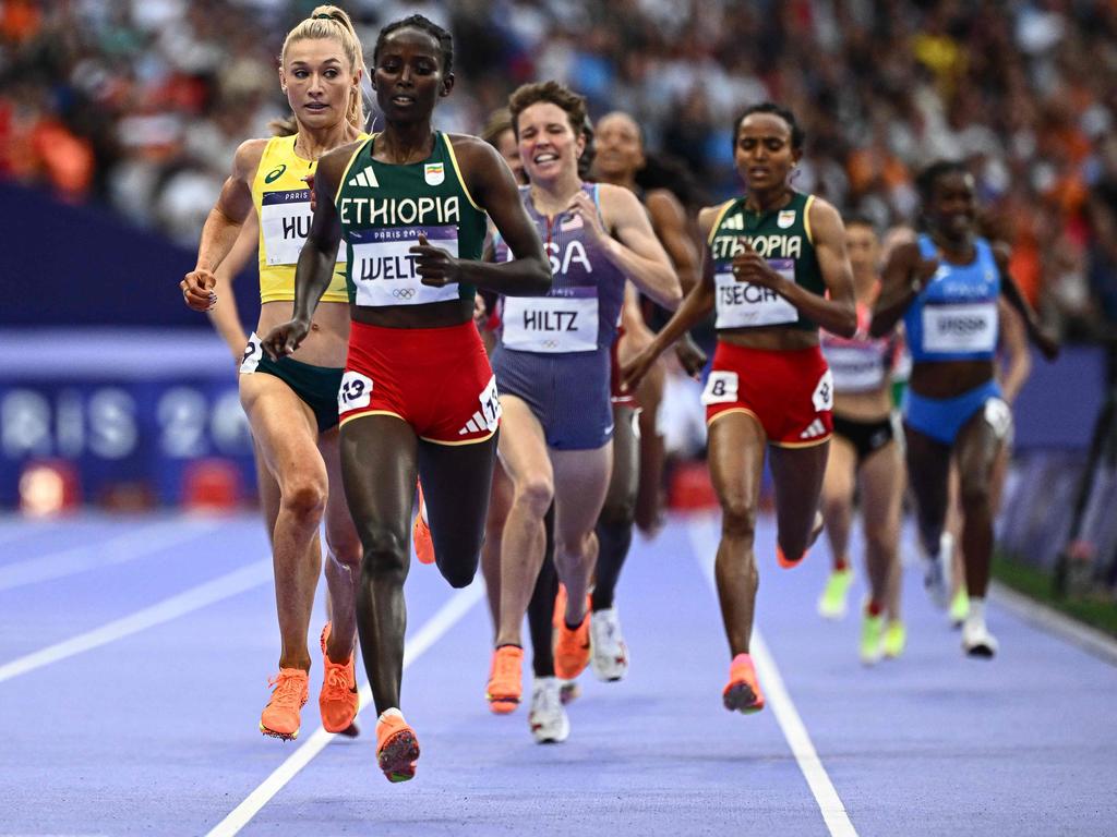 Ethiopia's Diribe Welteji crosses the finish line ahead of Australia's Jessica Hull and USA’s Nikki Hiltz in the women's 1500m semi-final of the athletics event at Stade de France on August 8. Picture: Jewel Samad/AFP