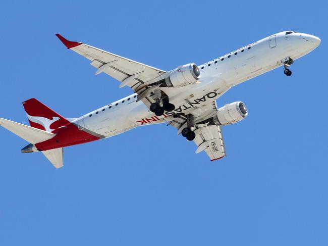 BRISBANE, AUSTRALIA - NewsWire Photos SEPTEMBER 30, 2024: A Qantas plane prepares to land in Brisbane. Hundreds of Qantas workers went on strike today demanding higher wages. Picture: NewsWire/Tertius Pickard