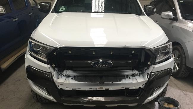 The white Ford Ranger Wildtrak repeatedly rammed the terrified family.
