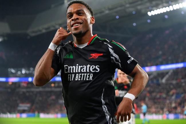 Arsenal's Dutch defender Jurrien Timber celebrates scoring his team's first goal in Eindhoven