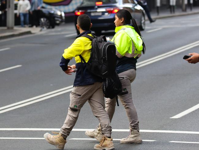 SYDNEY, AUSTRALIA - NewsWire Photos JUNE 01, 2021: A view of tradies heading home in the afternoon in the CBD in Sydney, Australia. Picture: NCA NewsWire / Gaye Gerard