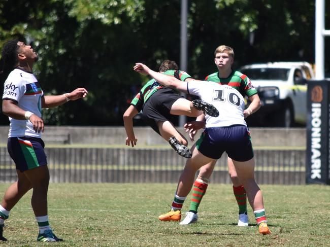 Harry Durbin of the Warriors hits Leroy Murray late. Picture: Sean Teuma/NewsLocal