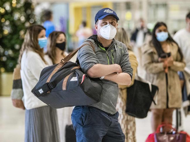 Virgin flight VA925 from Sydney, first people who can home quarantine after the state reached 70% vaccination rate.Picture: NIGEL HALLETT