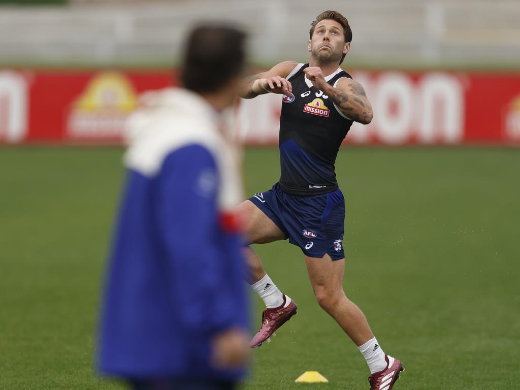 MELBOURNE, AUSTRALIA - MAY 09: Luke Beveridge, Senior Coach of the Bulldogs watches Caleb Daniel during a Western Bulldogs AFL training session at Whitten Oval on May 09, 2024 in Melbourne, Australia. (Photo by Darrian Traynor/Getty Images)