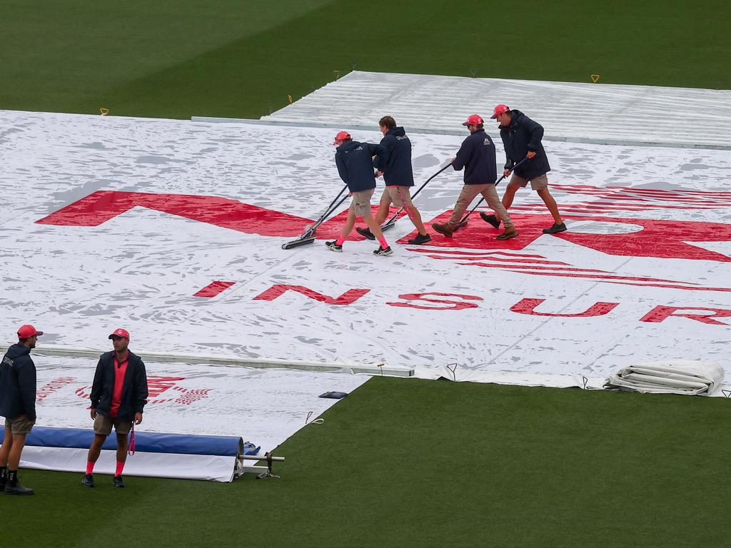 Groundstaff were forced to replace patches of turf near the popping crease. Picture: David Gray/AFP