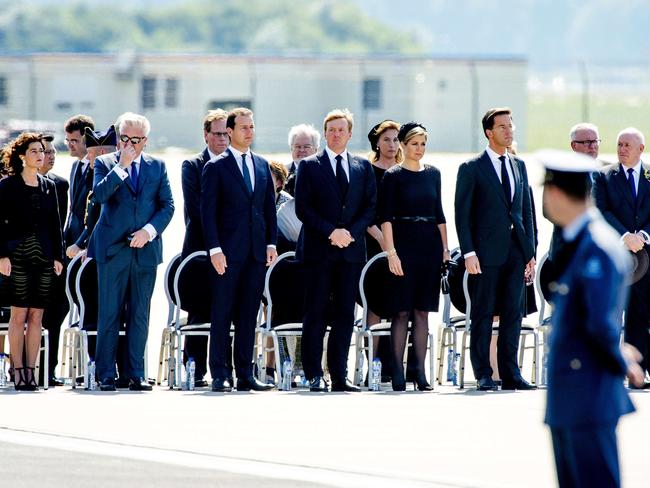 (From L) Prince Laurent of Belgium, Dutch Labor Minister Lodewijk Asscher, King Willem-Alexander and Queen Maxima of The Netherlands, and Dutch Prime minister Mark Rutte attend a ceremony for the victims at Eindhoven Airbase. Picture: Robin van Lonkhuijsen
