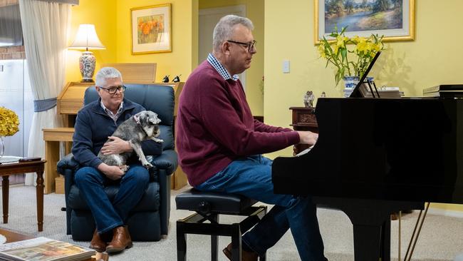 Peter Grace and Peter Sanders in their Armidale home. Picture: Simon Scott