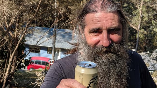 Binna Burra resident Scott Pospisil was working in the Snowy Mountains when he was told his house on Timbarra Dr had burnt down. He was thrilled to find the building still standing on his return home. Picture: Luke Mortimer