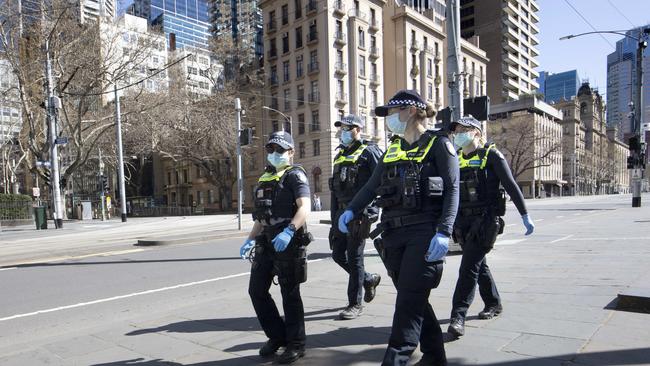 Police officers on patrol in Melbourne CBD during stage four lockdowns. Picture: NCA NewsWire/David Geraghty