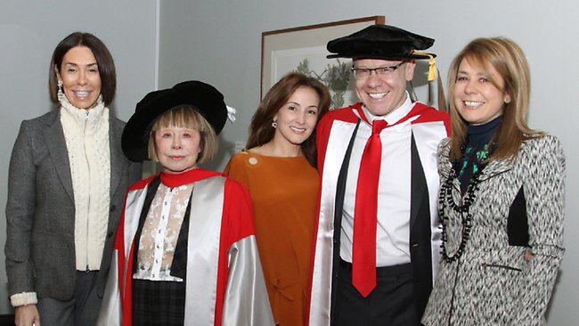 Anthony Pratt receives his doctorate accompanied by his sister Heloise Waislitz, left, mother Jeanne Pratt, partner Caludine Revere, and sister Fiona Geminder