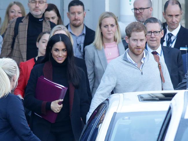 Meghan and Harry arriving at Sydney Airport on Monday.