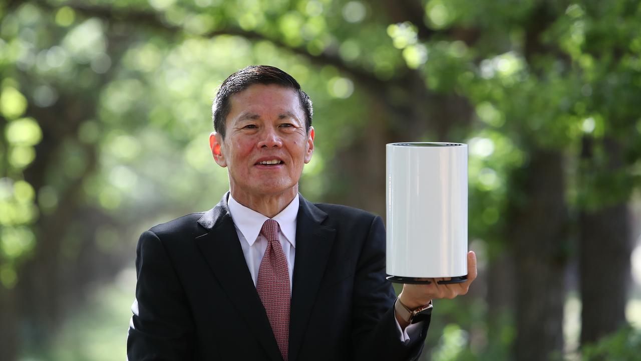 Optus CEO Allen Lew with the specially designed modem you get when you sign up for the company’s 5G home broadband plan.