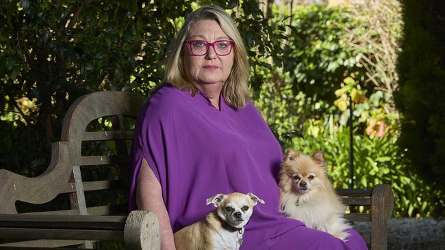 Jane Price with her dogs, Baby, 7, and Teddy, 7, at home in Toorak Gardens. Picture: Matt Loxton