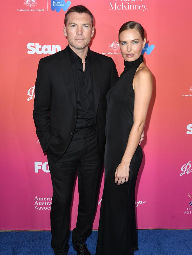 Sam and Lara Worthington walk the carpet before Avatar star Sam is honoured with Excellence in Film and TV. Picture: JC Olivera/WireImage