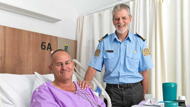 Survivor Chris Newlyn with VMR skipper Charles Linsley at Mackay Base Hospital. Picture: Emma Murray