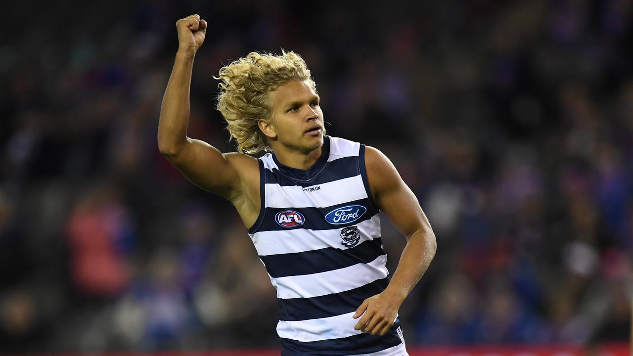 Quinton Narkle reacts after kicking a goal in his debut on Friday night.