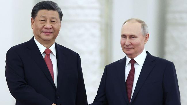 Russian President Vladimir Putin meets with China's President Xi Jinping at the Kremlin in Moscow on March 21, 2023. Picture: AFP.