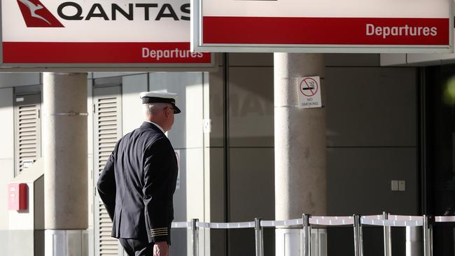 QANTAS pilots and staff at Brisbane airport. Photographer: Liam Kidston.