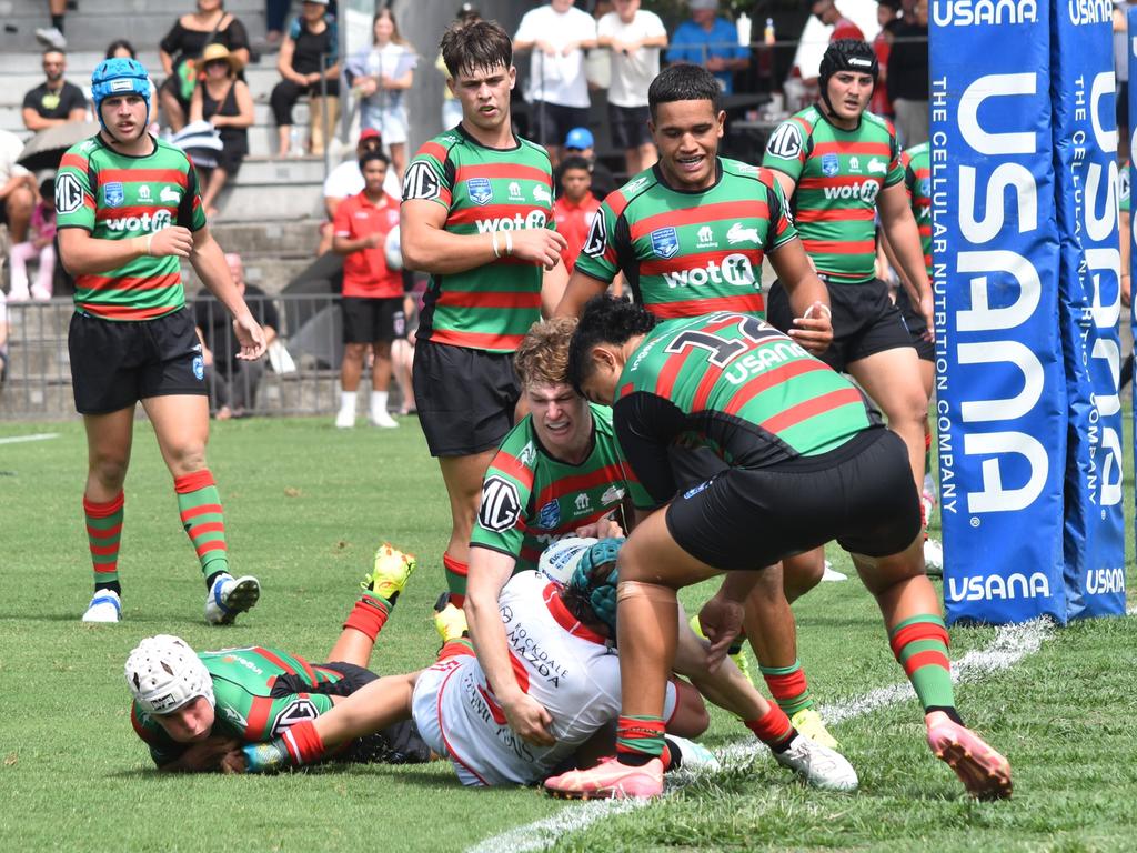 Christian Mardini is held up by Darcy Feltham (left) and Taj Aufai-Farani. Picture: Sean Teuma