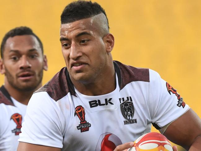 Viliame Kikau of Fiji (right) runs at Danny Levi of New Zealand during the 2017 Rugby League World Cup quarter final match between New Zealand and Fiji at Westpac Stadium in Wellington, New Zealand, Saturday, November 18, 2017. (AAP Image/SNPA, Ross Setford) NO ARCHIVING, EDITORIAL USE ONLY