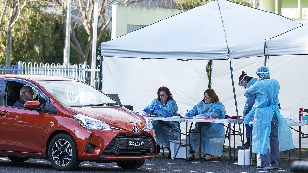 Staff are seen at a pop-up COVID-19 test site in Broadmeadows on Wednesday. Picture: Daniel Pockett/Getty Images