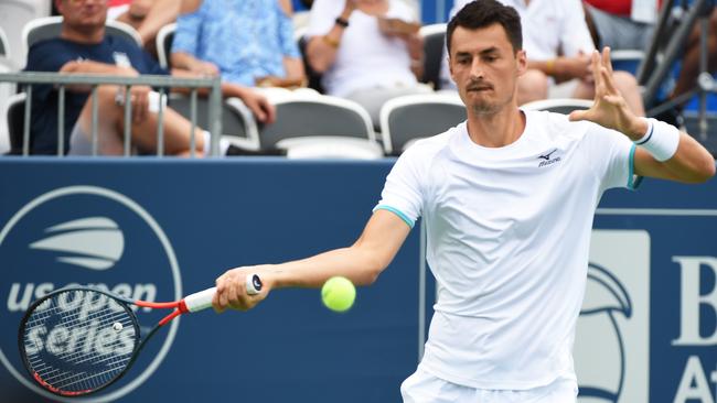 Bernard Tomic is hoping more players withdraw from the US Open.