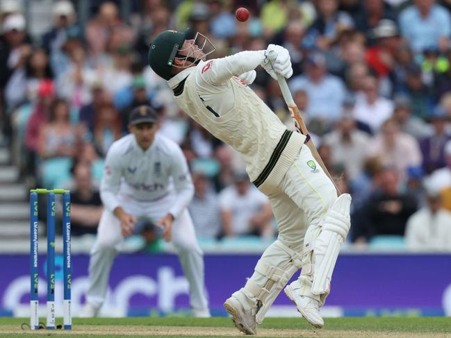 David Warner manages to avoid, and hit for four, a rare beamer from James Anderson. Pictrre: Adrian Dennis/AFP