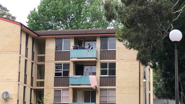 Police arrest Jerome on the balcony of a Mangerton apartment. Picture: Madeline Crittenden