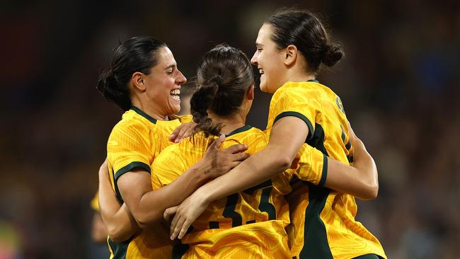 MELBOURNE, AUSTRALIA - DECEMBER 04: Bryleeh Henry of Australia celebrates with team mates after scoring a goal during the International Friendly match between Australia Matildas and Chinese Taipei at AAMI Park on December 04, 2024 in Melbourne, Australia. (Photo by Daniel Pockett/Getty Images)