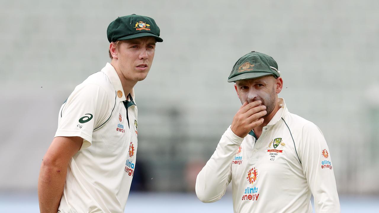 Boxing Day cricket Test Match at the Melbourne Cricket Ground (MCG). Day 2. 27/12/2020. Nathan Lyon and Cameron Green look towards the crowd during the 1st session . Pic: Michael Klein