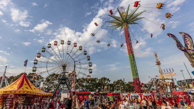 Crowds enjoying the carnival rides at the 2019 Sydney Royal Easter Show.