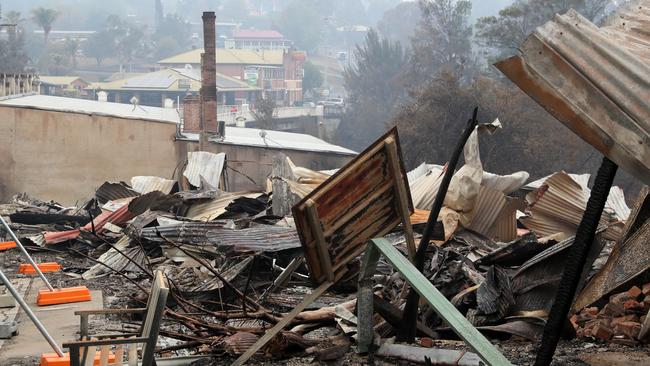 Buildings destroyed by last week's bushfire on the Princes Highway in the main street of Cobargo. The town has lost between 50-60 homes. Picture: Jonathan Ng