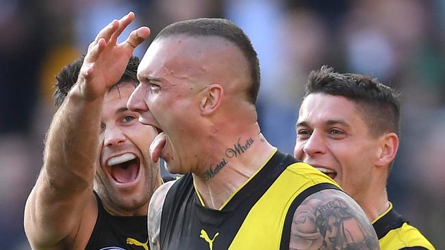 Dustin Martin celebrates one of his four goals during the AFL grand final. Picture: AAP Image/Michael Dodge.