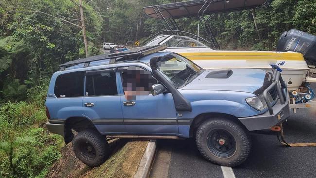 A four-wheel drive towing a boat has jackknifed on the Kuranda Range Road. Picture: Facebook