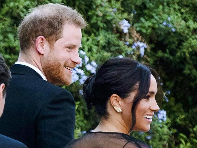 Prince Harry and Meghan arrive at the wedding of Misha Nonoo and Michael Hess in Rome. Picture: AP