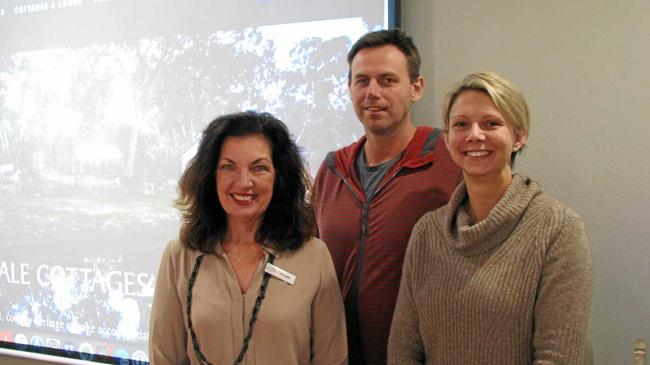 DIGITAL WORLD: Liz Ward, of Tourism Tribe, with Stephen and Taya Michalski, owners of Diamondvale Cottages. Picture: DEIRDRE SMITH