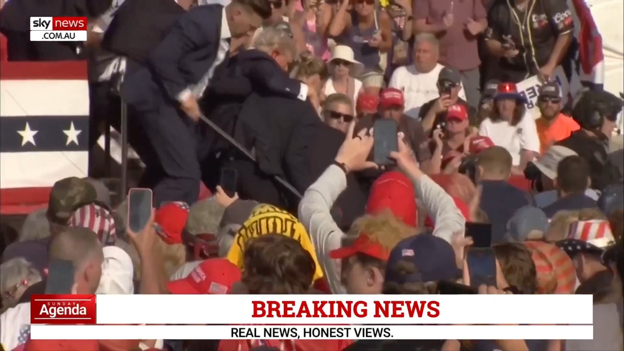 Secret Service assist Donald Trump off stage following incident at rally