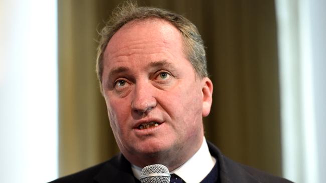 Deputy Prime Minister and Minister for Agriculture and Water Resources Barnaby Joyce arrives at a dairy symposium in Melbourne. Picture: AAP