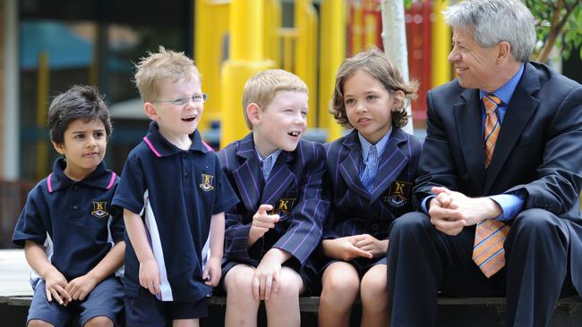 Kilvington Grammar principal Jon Charlton with four of the first boys to join the school in 2011 when it went co-ed: (from left) Zane, Paddy, William and Harry.