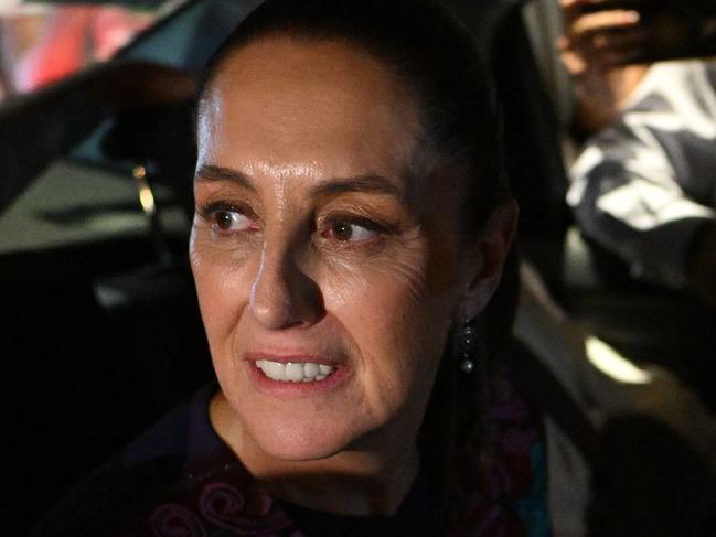 Mexico's presidential candidate for Morena party Claudia Sheinbaum leaves in a car to Zocalo Square following the results of the general election in Mexico City, on June 3, 2024. Claudia Sheinbaum was set to be elected Mexico's first woman president, exit polls showed, a milestone in a country with a history of gender-based violence. (Photo by CARL DE SOUZA / AFP)