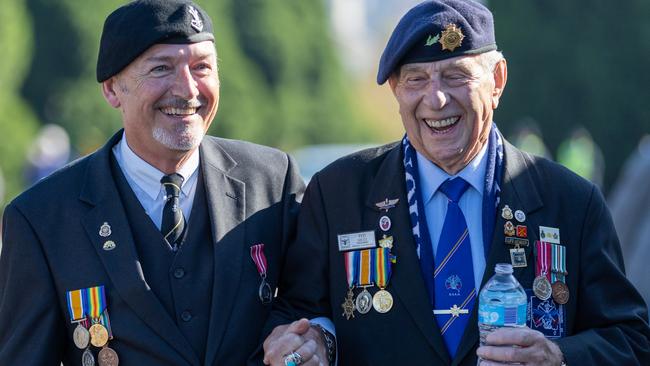 Syd Sault, right, marches with a fellow Digger in the Anzac Day Parade in Melbourne. Picture: Getty Images