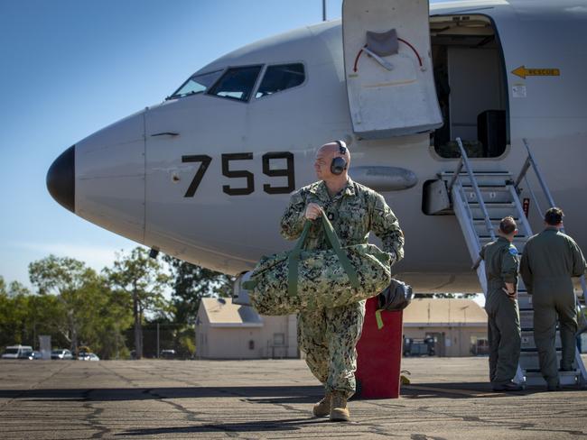 United States Navy Chief Petty Officer Jason King drops off luggage after arriving at RAAF Base Darwin in the lead up to Exercise Talisman Sabre. Picture: Chris Tsakisiris