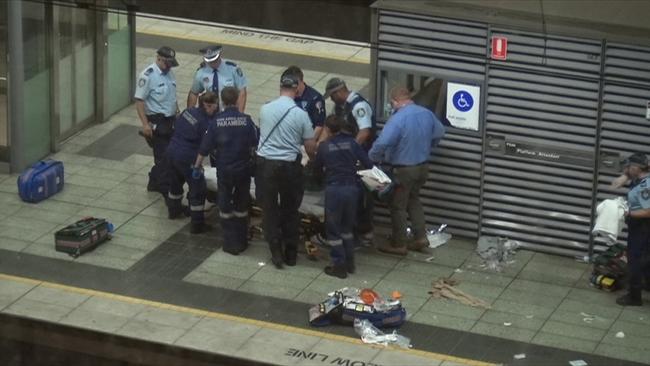 Paramedics and police rush to treat Callum at Sydney Olympic Park stadium. Picture: 7News