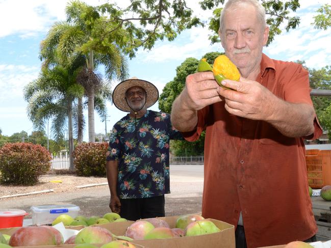 Mango man Henry Petersen with fruit picker Dion Henaway said mangos were flying off the table during their first day in Charters Towers.